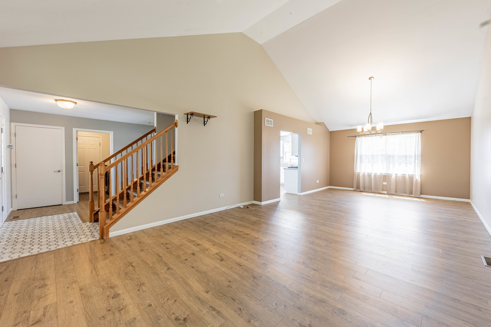 16263 Celtic Circle Manhattan, IL 60442 - Photo 8 of 45 a view of an entryway with wooden floor