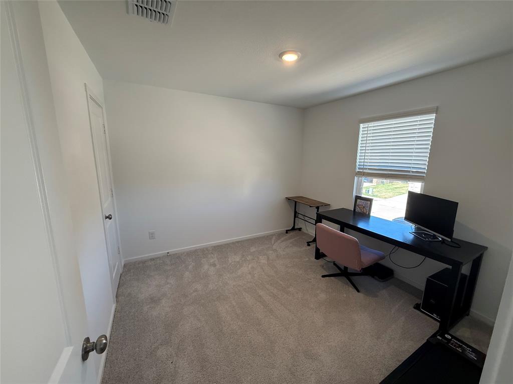 14120 Hammersmith Street Pilot Point, TX 76258 - Photo 7 of 12 a reading room with furniture and a window