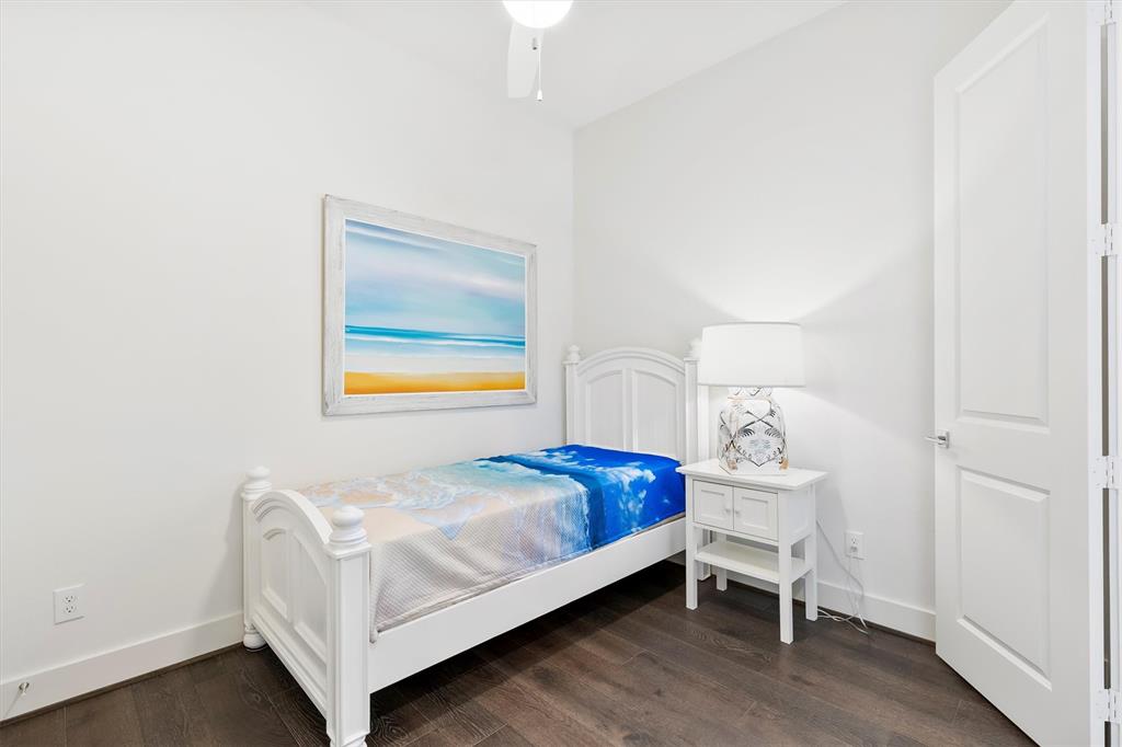 15875 Spectrum Drive, Unit 1106 Addison, TX 75001 - Photo 18 of 39 a bedroom with a bed and a window