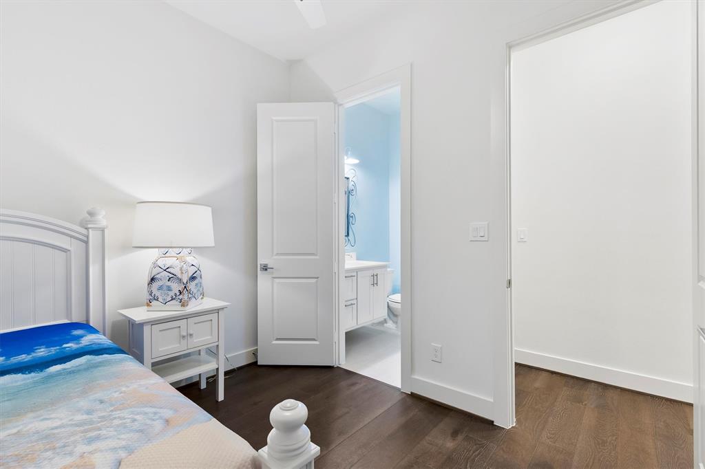 15875 Spectrum Drive, Unit 1106 Addison, TX 75001 - Photo 20 of 39 a living room with furniture and wooden floor