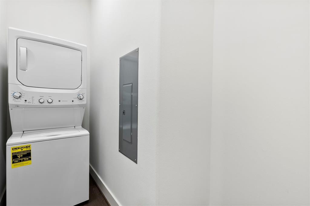 15875 Spectrum Drive, Unit 1106 Addison, TX 75001 - Photo 26 of 39 Separate Laundry room inside the unit with stacked washer / dryer (included) and electric panel