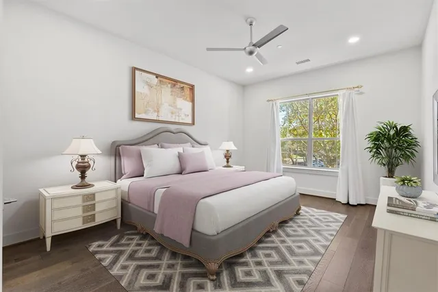a view of kitchen with stainless steel appliances kitchen island a refrigerator and a stove top oven