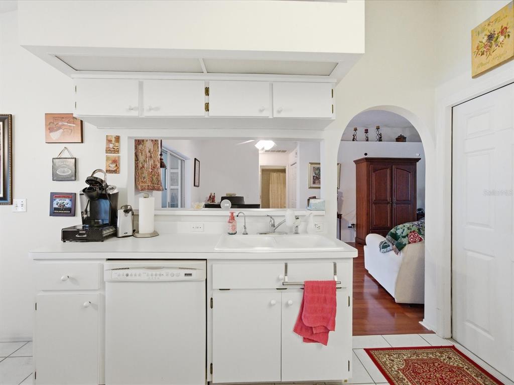 4209 Avanti Circle New Port Richey, FL 34655 - Photo 18 of 35 a bathroom with a sink double vanity and a mirror
