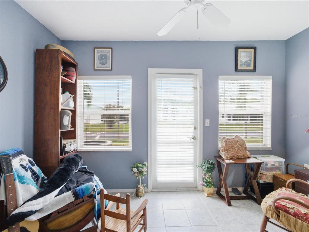 4209 Avanti Circle New Port Richey, FL 34655 - Photo 22 of 35 a living room with furniture and a window