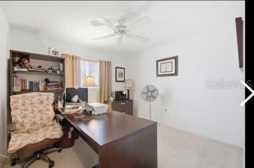 4209 Avanti Circle New Port Richey, FL 34655 - Photo 25 of 35 a view of a workspace with furniture