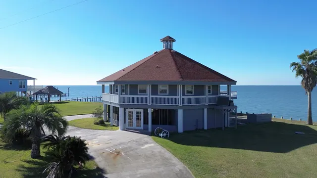 a view of a house with a swimming pool
