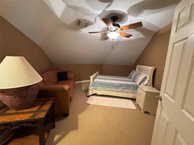 a view of a livingroom with furniture