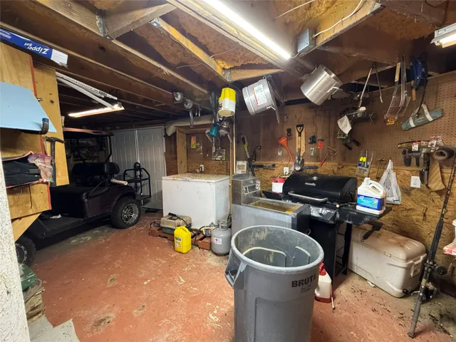 a view of a house with wooden deck