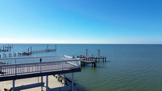a terrace of a house with outdoor seating