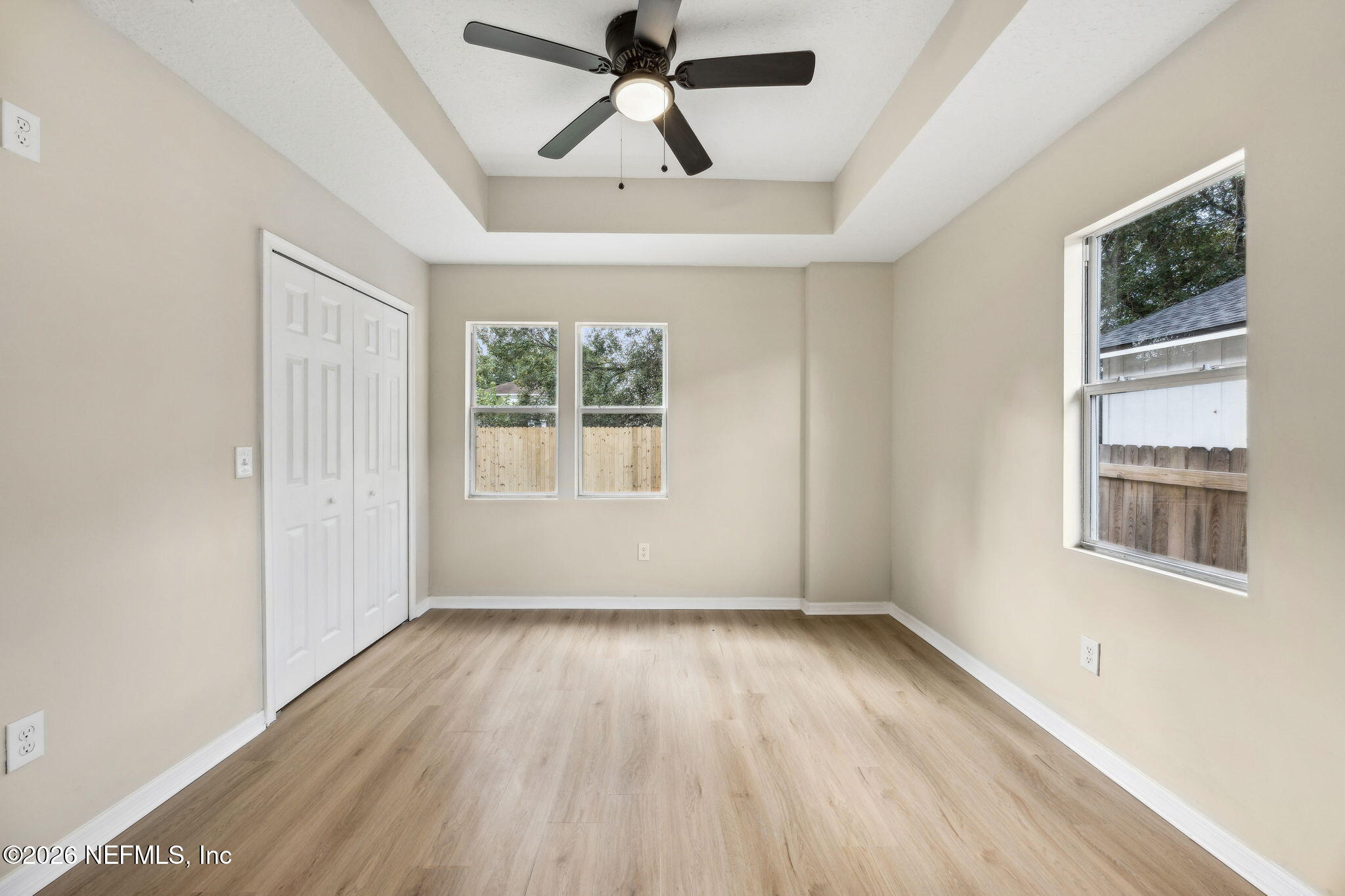 2562 Summit Street Jacksonville, FL 32204 - Photo 14 of 20 wooden floor in an empty room with a window