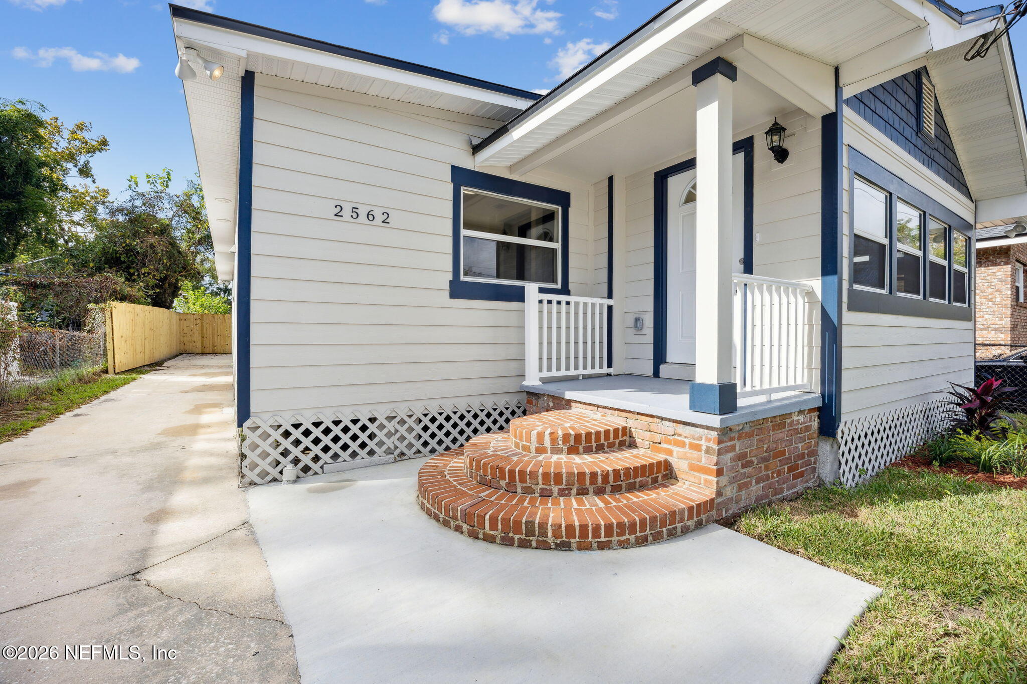 2562 Summit Street Jacksonville, FL 32204 - Photo 2 of 20 a view of a house with a chairs in a patio