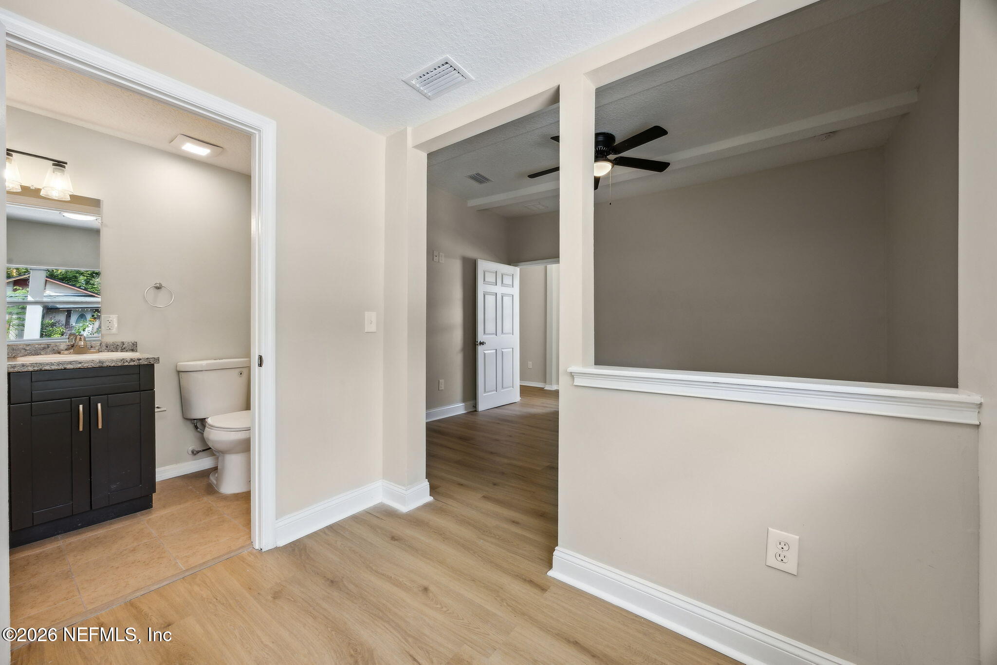 2562 Summit Street Jacksonville, FL 32204 - Photo 10 of 20 wooden floor in an empty room