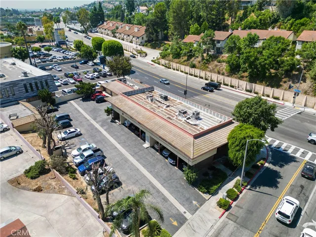 an aerial view of a house with outdoor space