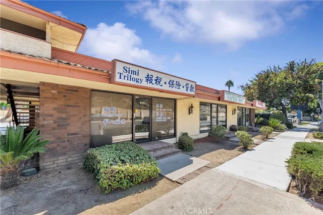 a view of a building with a garden