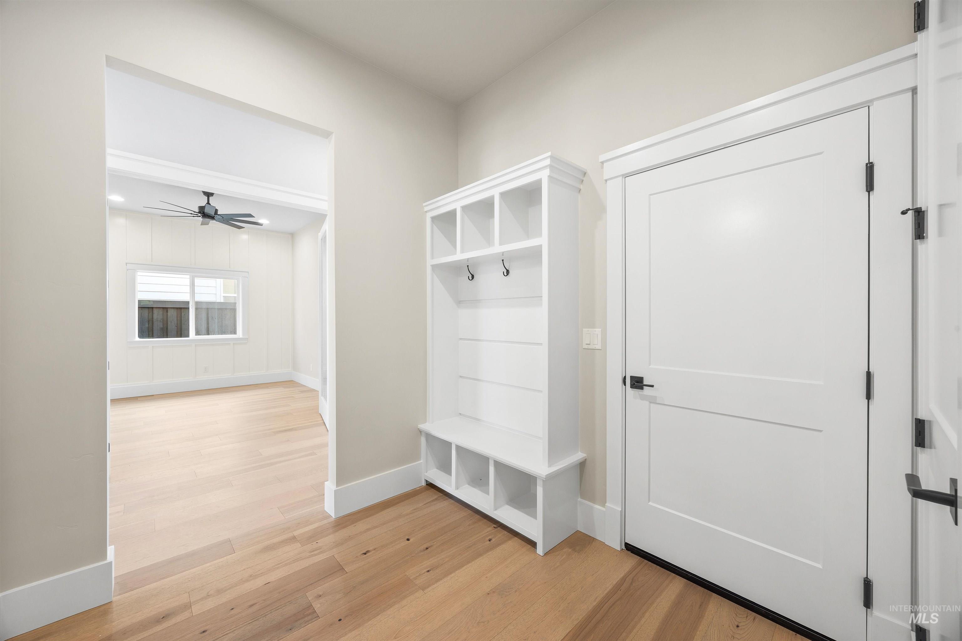 1126 East Crescendo Street Meridian, ID 83642 - Photo 38 of 48 Mudroom with light wood-type flooring and ceiling fan