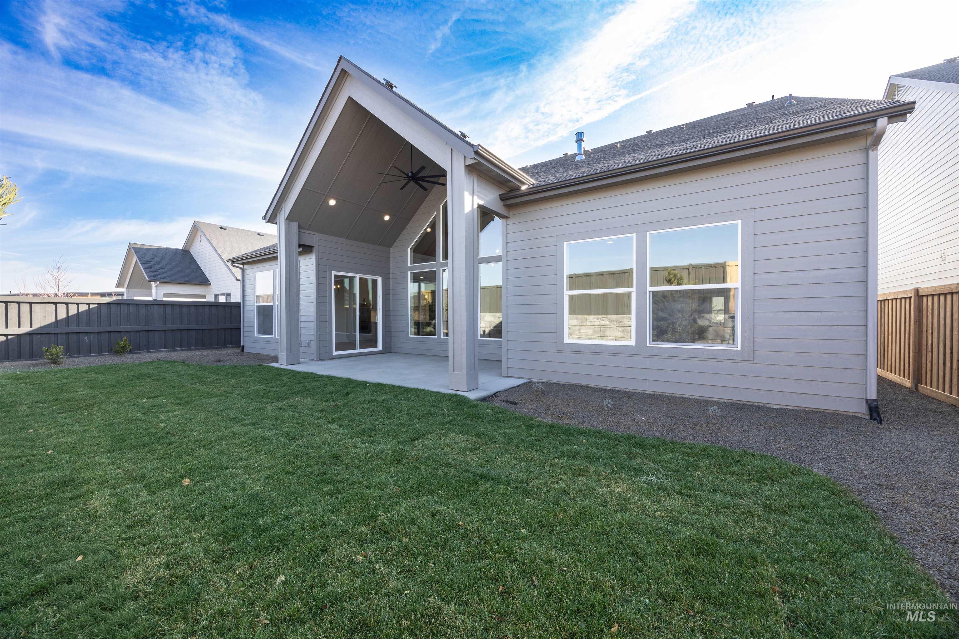 1126 East Crescendo Street Meridian, ID 83642 - Photo 41 of 48 Rear view of house with a fenced backyard, a patio area, and ceiling fan