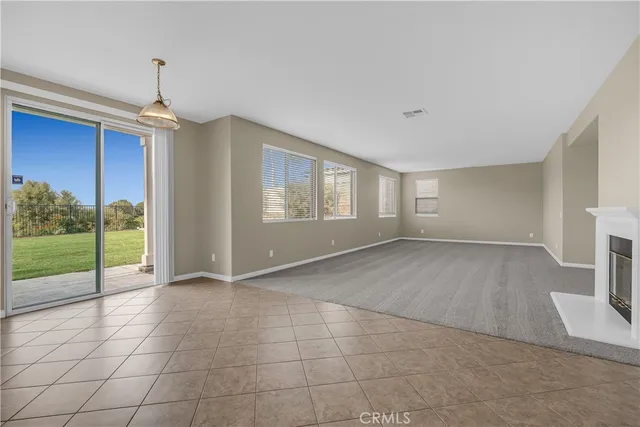 a living room with a fireplace