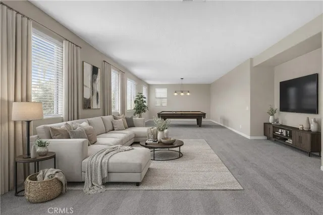 a view of empty room with a fireplace