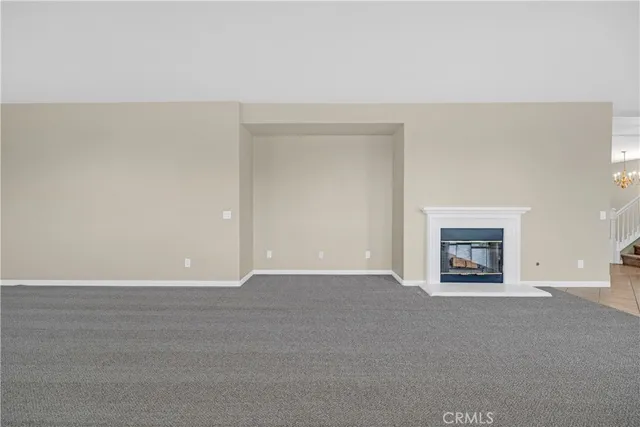 a view of empty room with floor and window