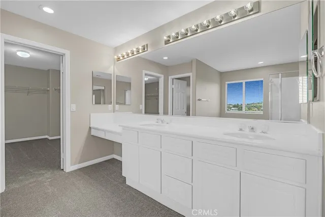 a view of a balcony with wooden floor