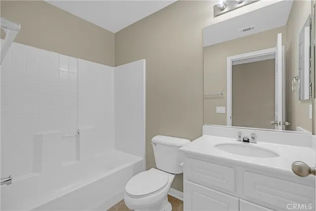 a spacious bathroom with a double vanity sink mirror double and bathtub