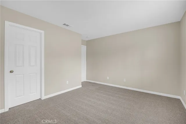 an aerial view of residential houses and outdoor space