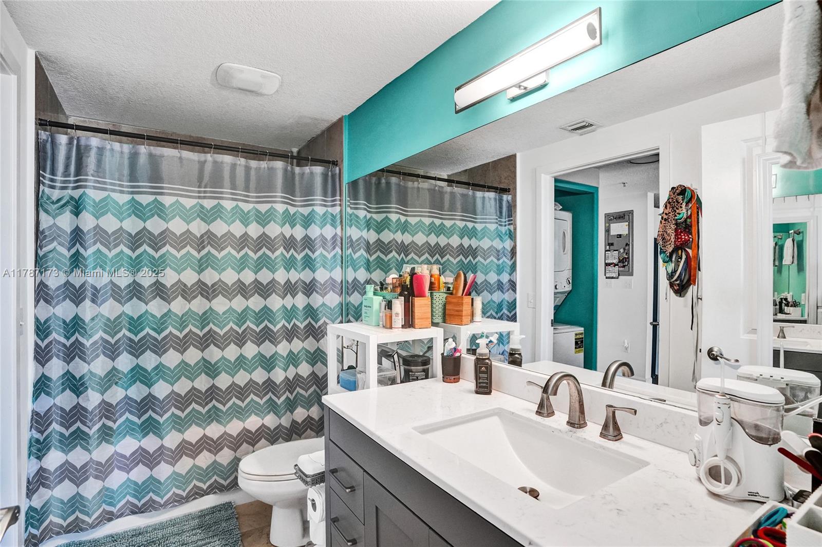 170 Southeast 14th Street, Unit 2907 Miami, FL 33131 - Photo 16 of 30 a bathroom with a sink and a mirror