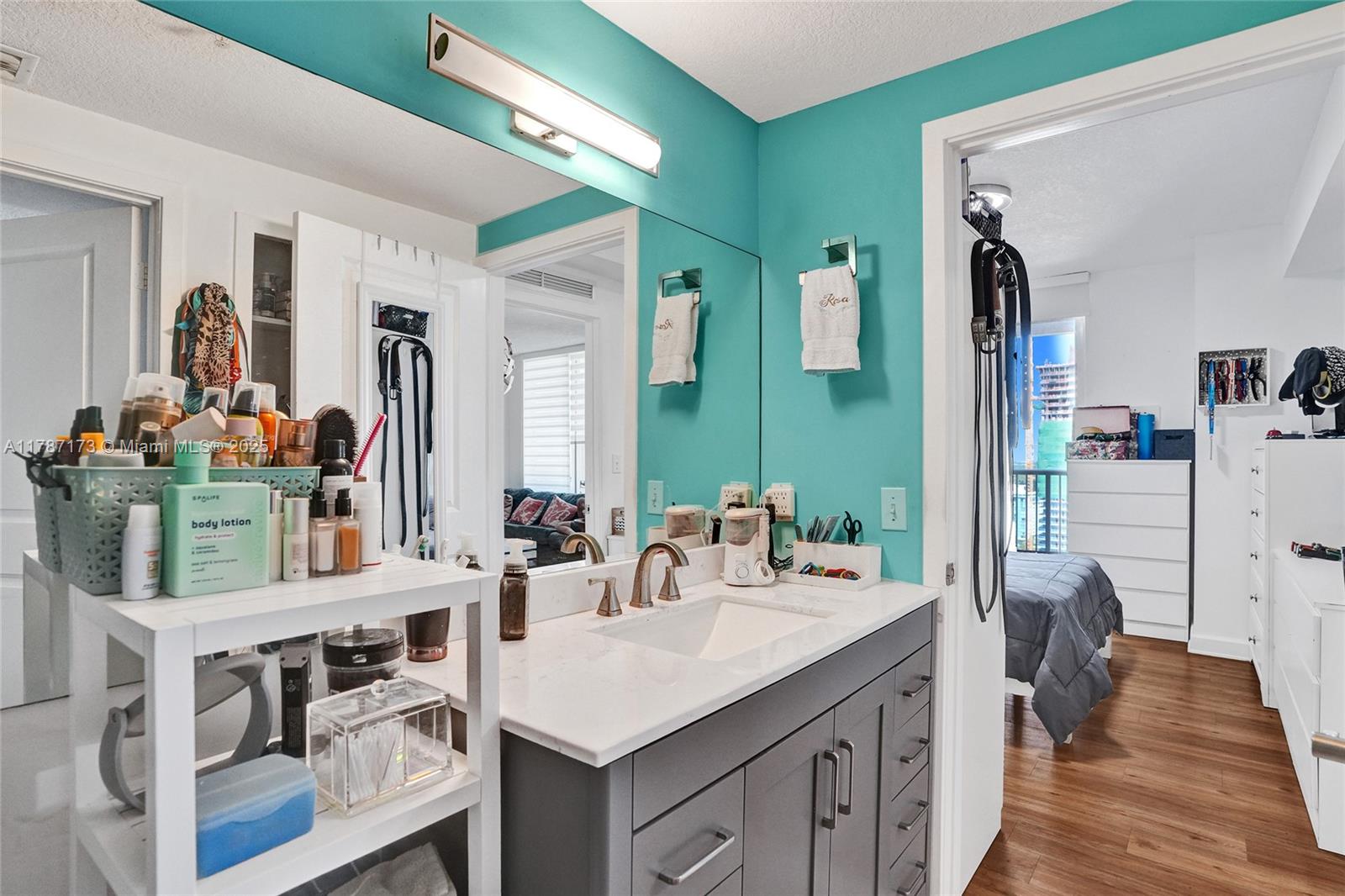 170 Southeast 14th Street, Unit 2907 Miami, FL 33131 - Photo 17 of 30 a bathroom with a sink double vanity and a mirror