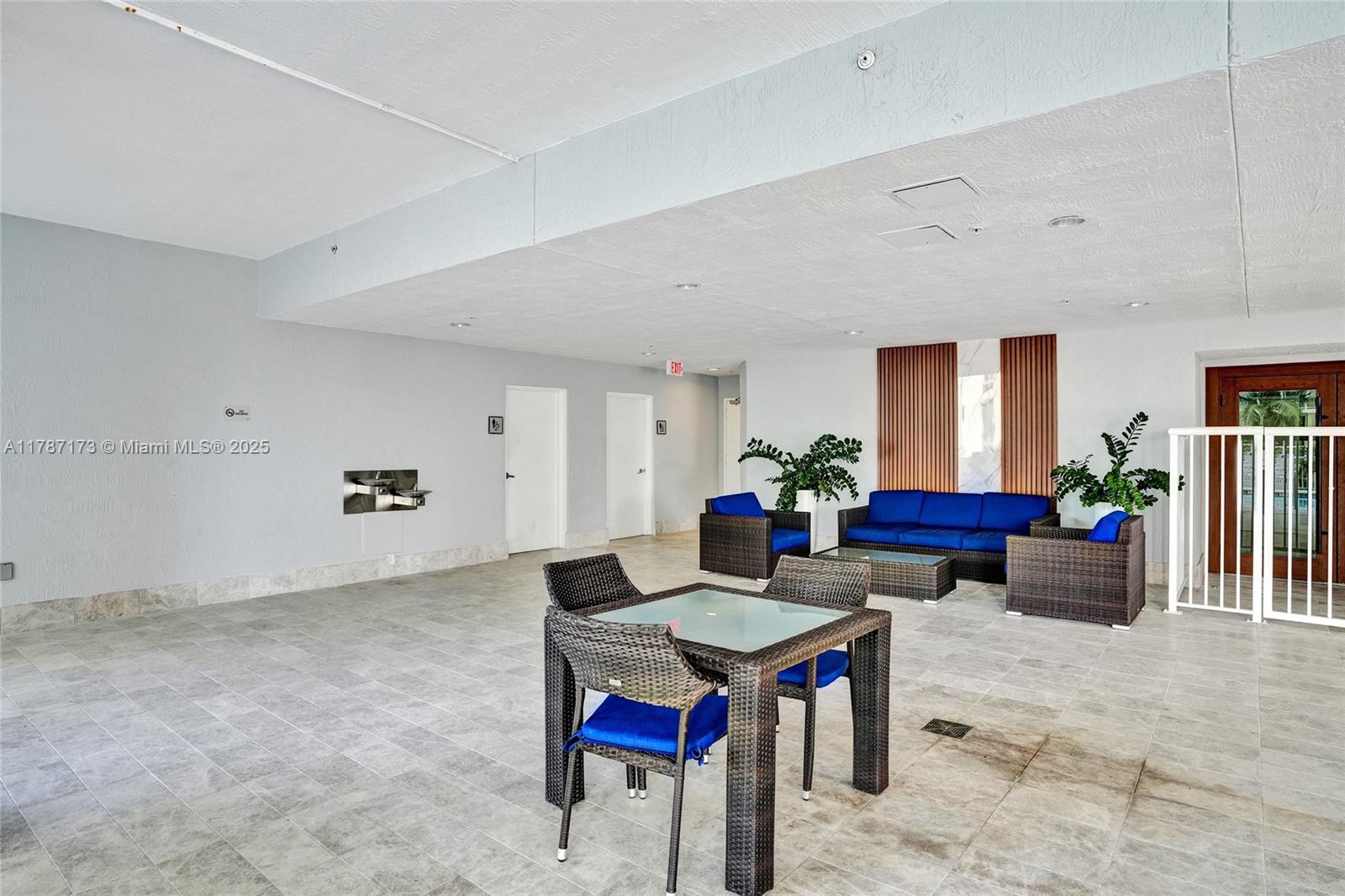 170 Southeast 14th Street, Unit 2907 Miami, FL 33131 - Photo 28 of 30 a living room with furniture and wooden floor