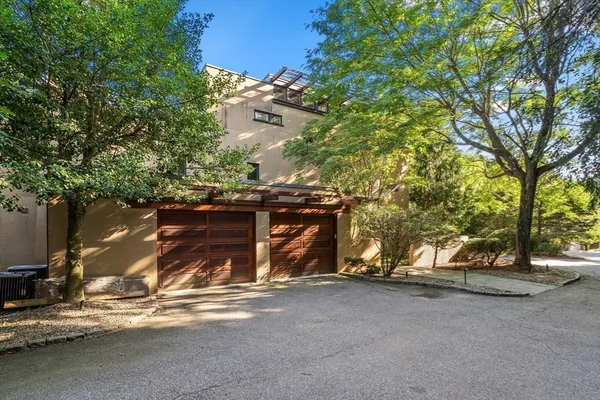 a view of a patio in the front of the house