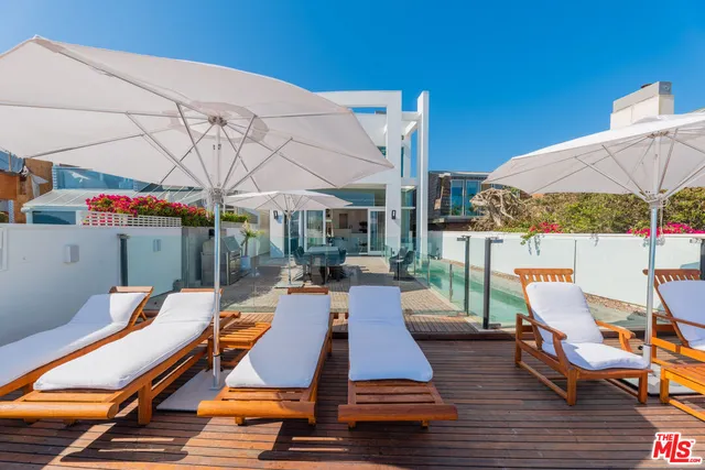 a building outdoor space with patio furniture