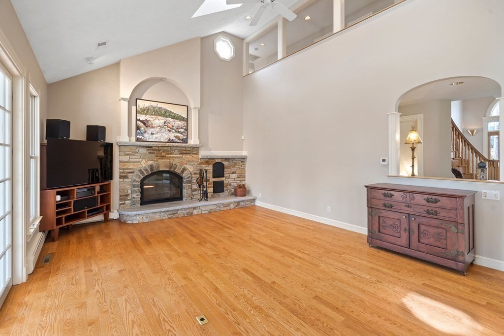 23 Louis Drive Wellesley, MA 02481 - Photo 11 of 42 a view of a livingroom with furniture and a flat screen tv
