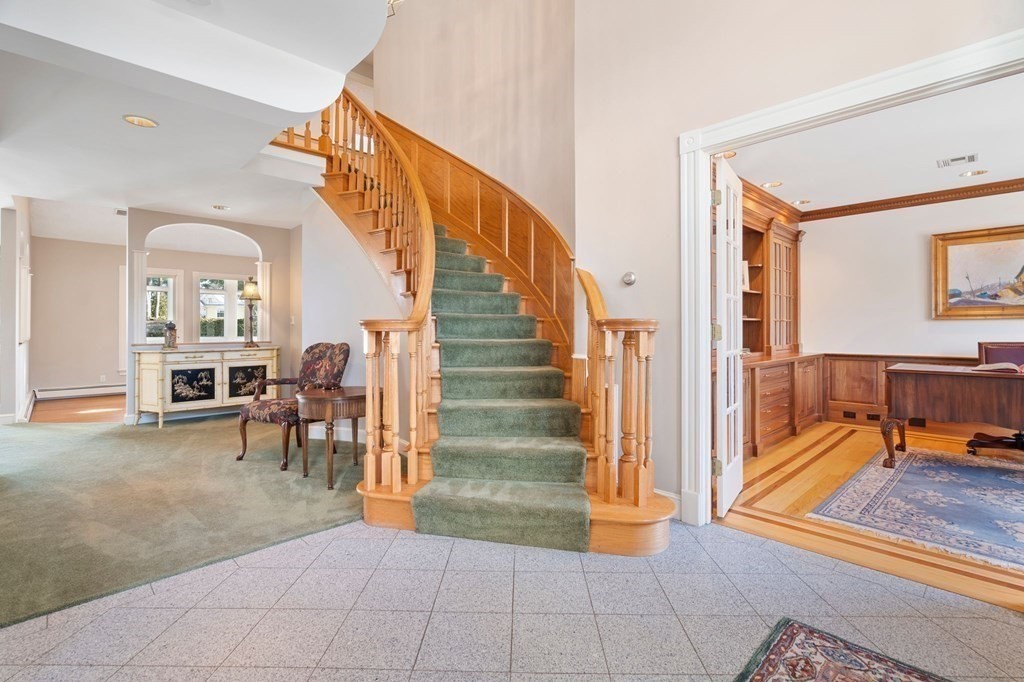23 Louis Drive Wellesley, MA 02481 - Photo 21 of 42 a view of a livingroom with furniture and a potted plant