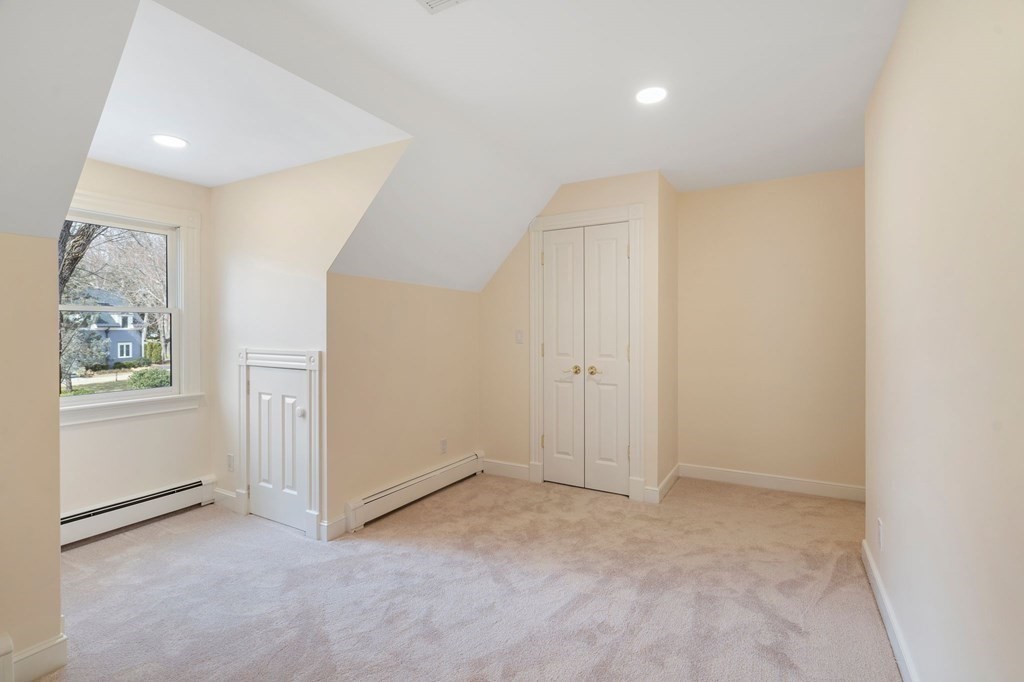 23 Louis Drive Wellesley, MA 02481 - Photo 27 of 42 an empty room with windows and closet