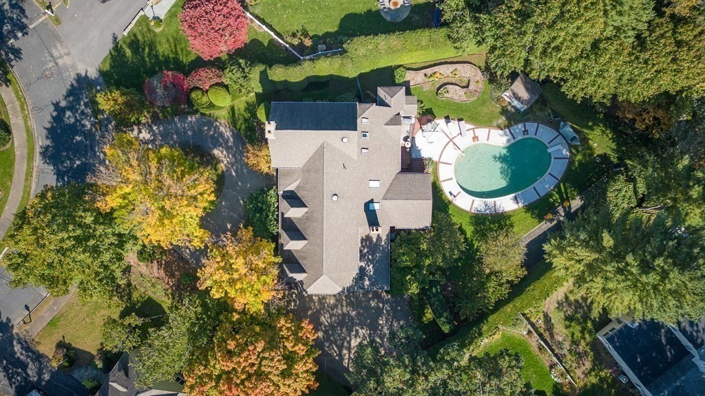 23 Louis Drive Wellesley, MA 02481 - Photo 3 of 42 an aerial view of residential house with outdoor space and swimming pool