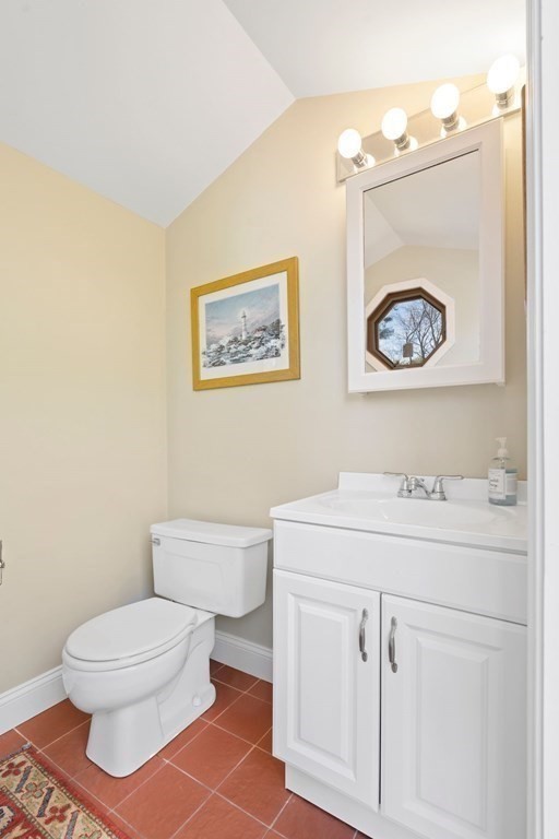 23 Louis Drive Wellesley, MA 02481 - Photo 37 of 42 a bathroom with a toilet a sink and vanity