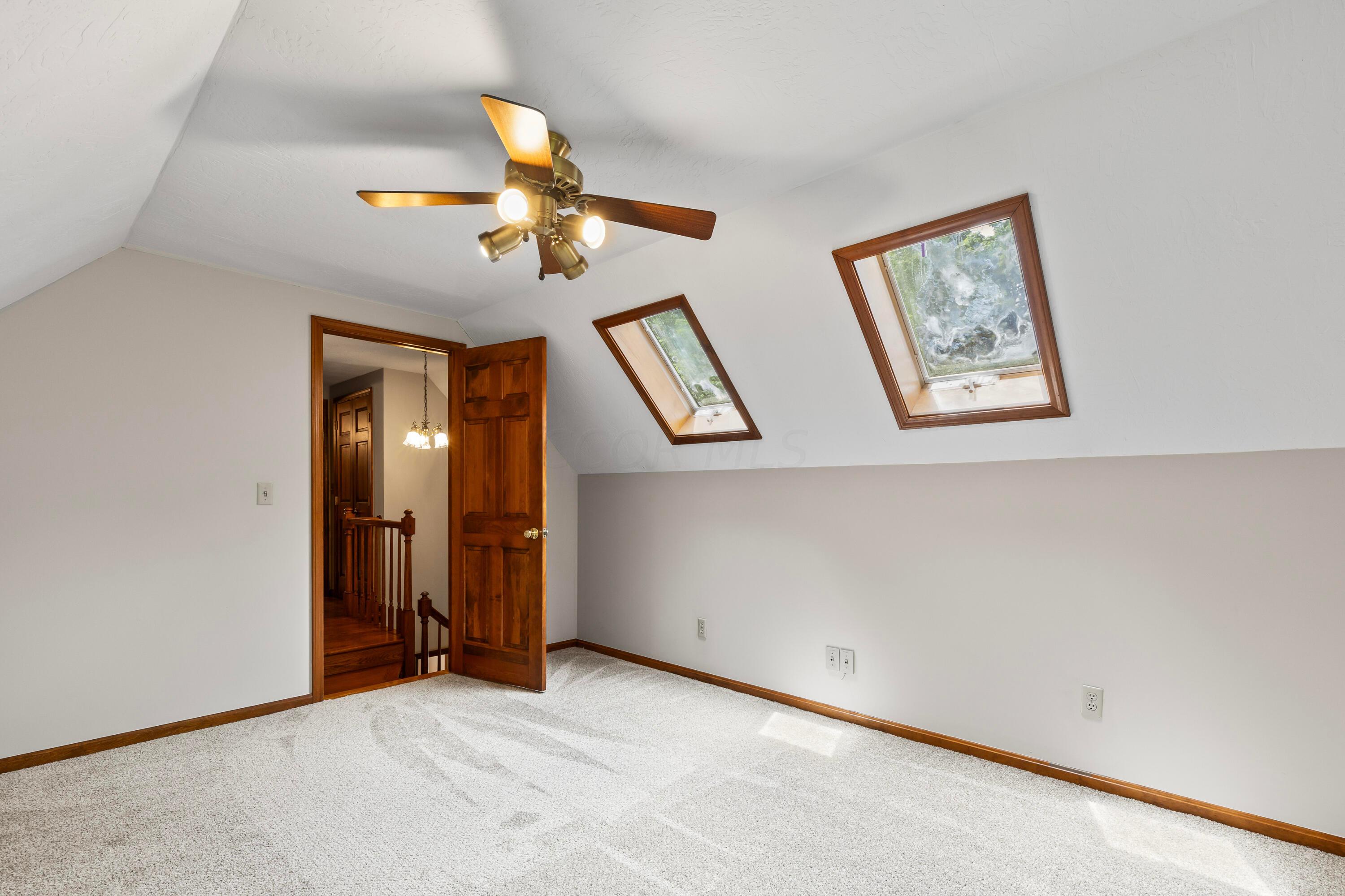 6940 Graham Road Mount Vernon, OH 43050 - Photo 41 of 70 • New light sand carpet
~ 06/2024
• Ivory painted walls
• Angled ceiling
• Lighted ceiling fan
• (2) skylights