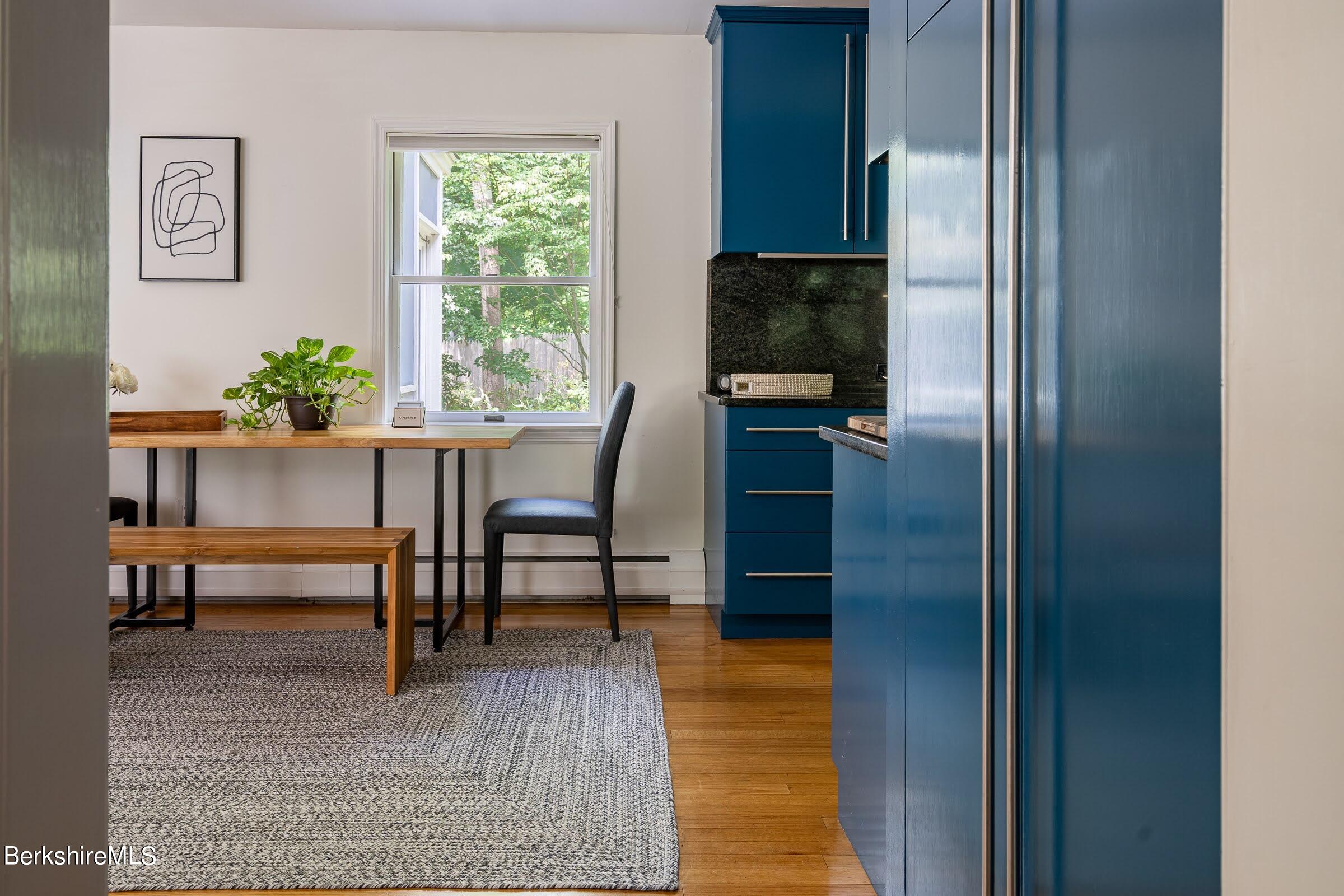 91 Brush Hill Road Great Barrington, MA 01230 - Photo 16 of 40 a view of a livingroom with furniture and a window