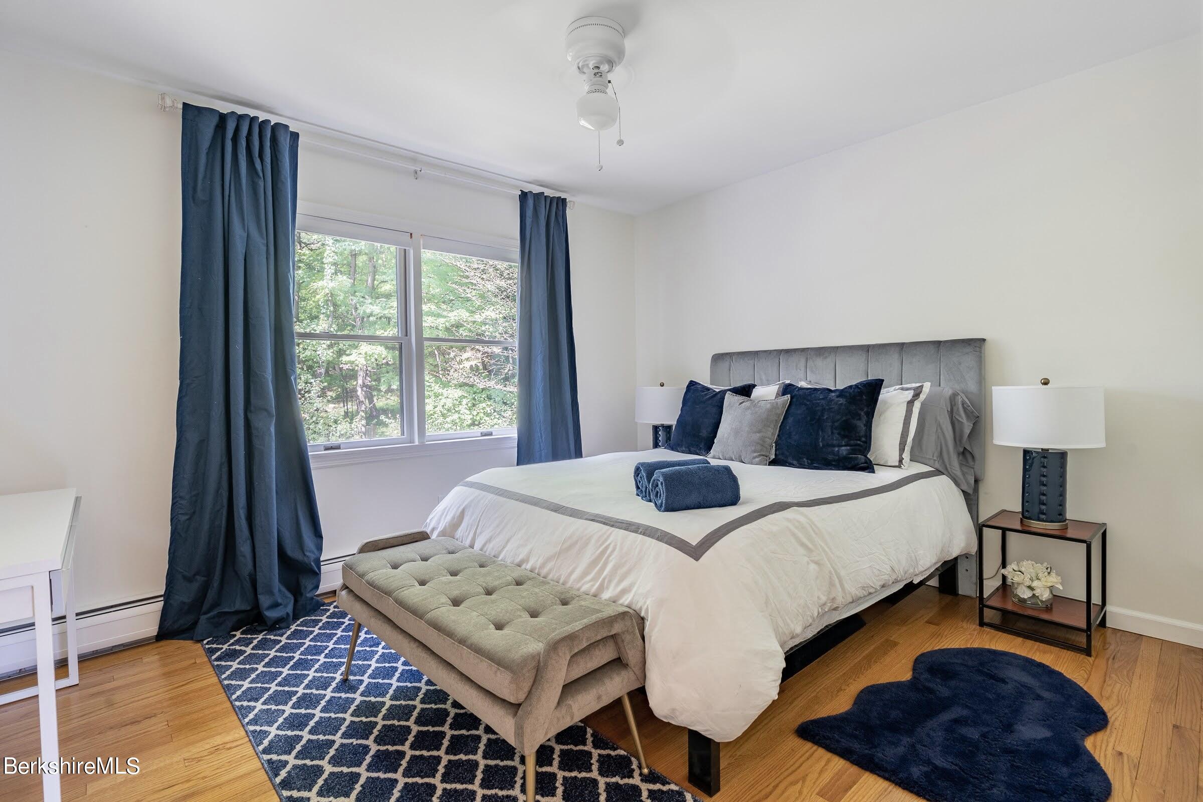 91 Brush Hill Road Great Barrington, MA 01230 - Photo 24 of 40 a bedroom with bed and a window