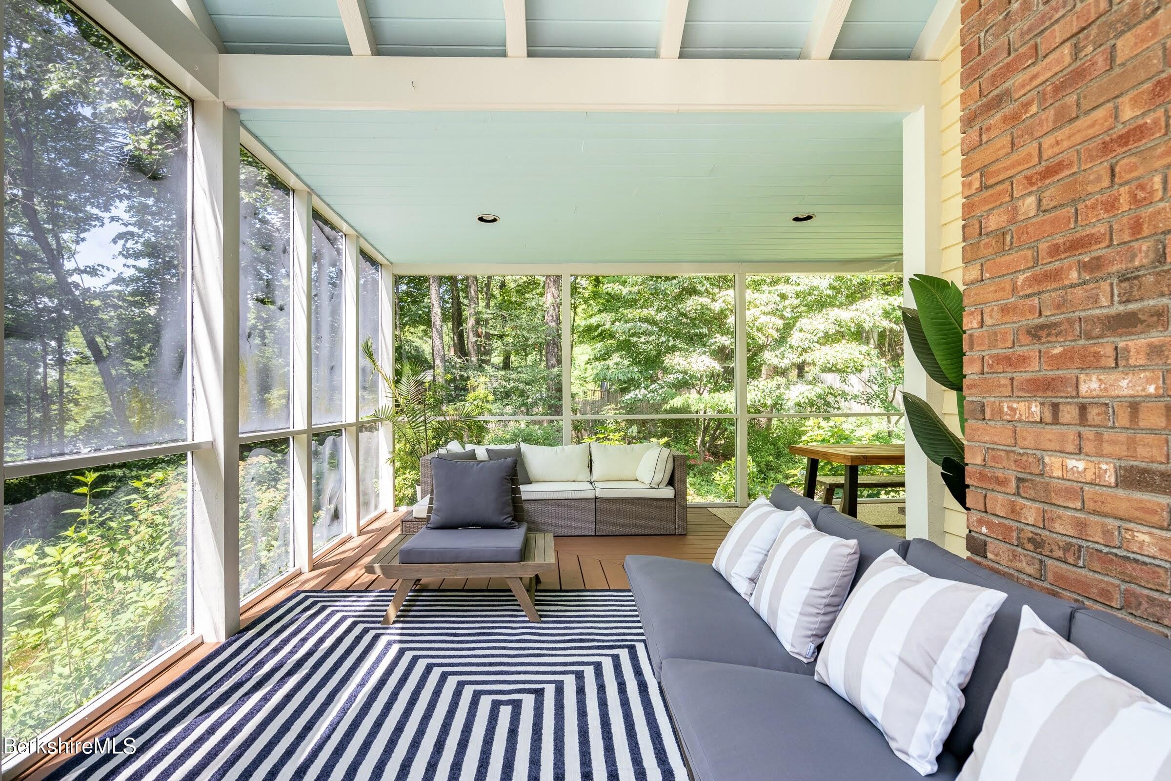 91 Brush Hill Road Great Barrington, MA 01230 - Photo 30 of 40 a living room with furniture and a large window