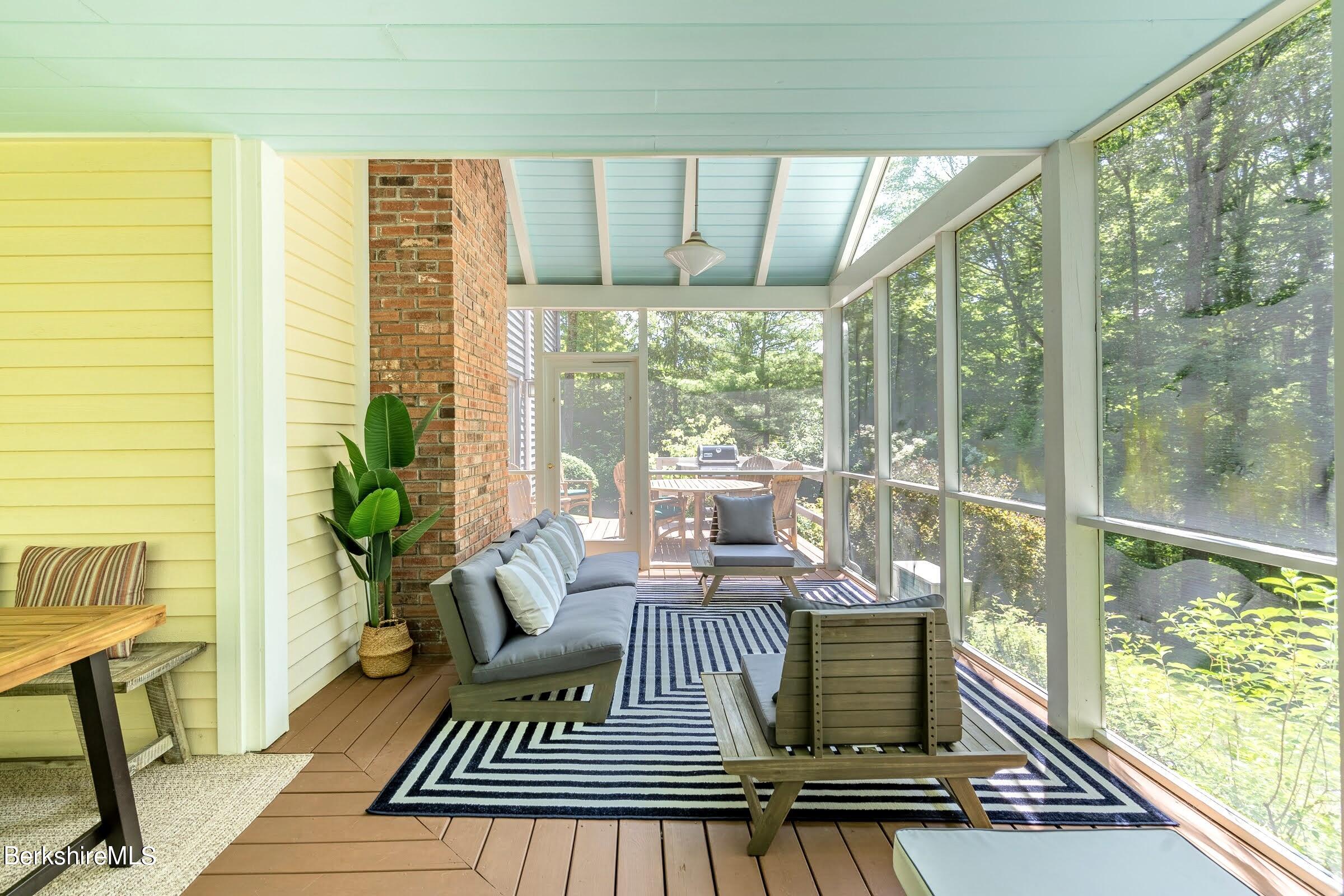 91 Brush Hill Road Great Barrington, MA 01230 - Photo 31 of 40 a view of outdoor space with seating area