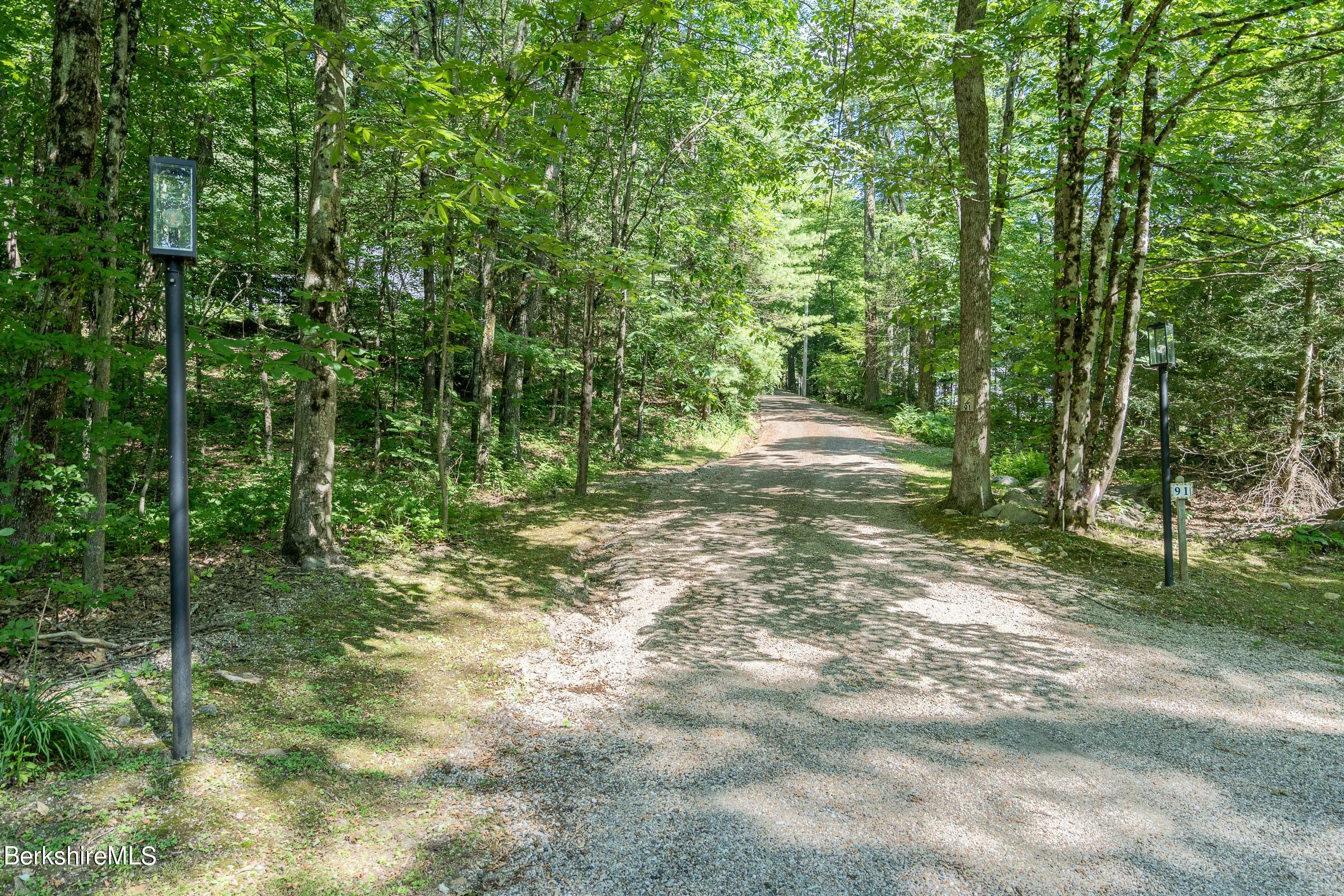 91 Brush Hill Road Great Barrington, MA 01230 - Photo 34 of 40 a big yard with lots of green space and trees