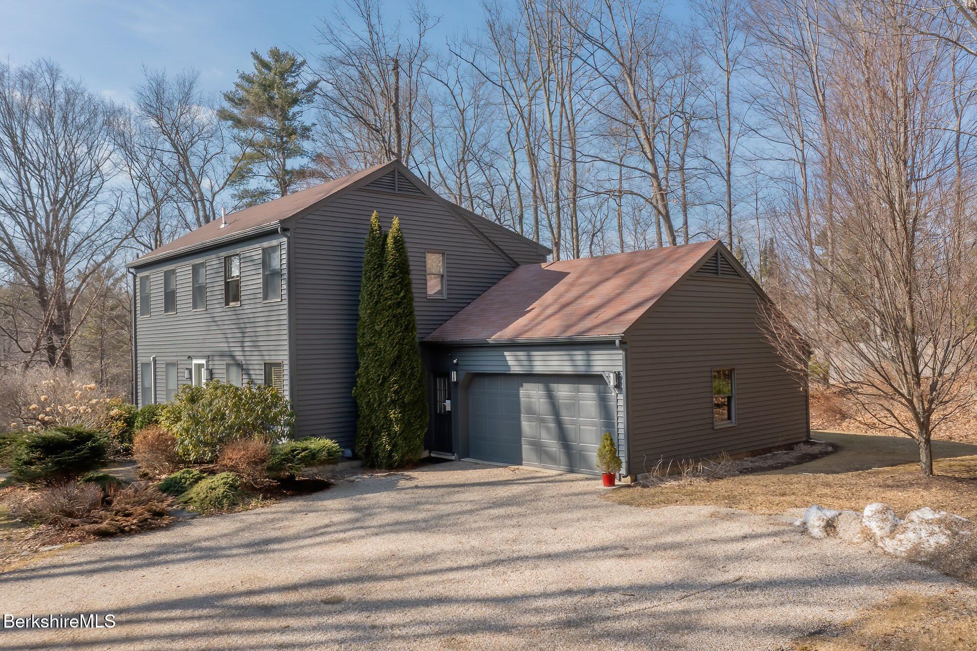 91 Brush Hill Road Great Barrington, MA 01230 - Photo 35 of 40 a view of a house with a yard