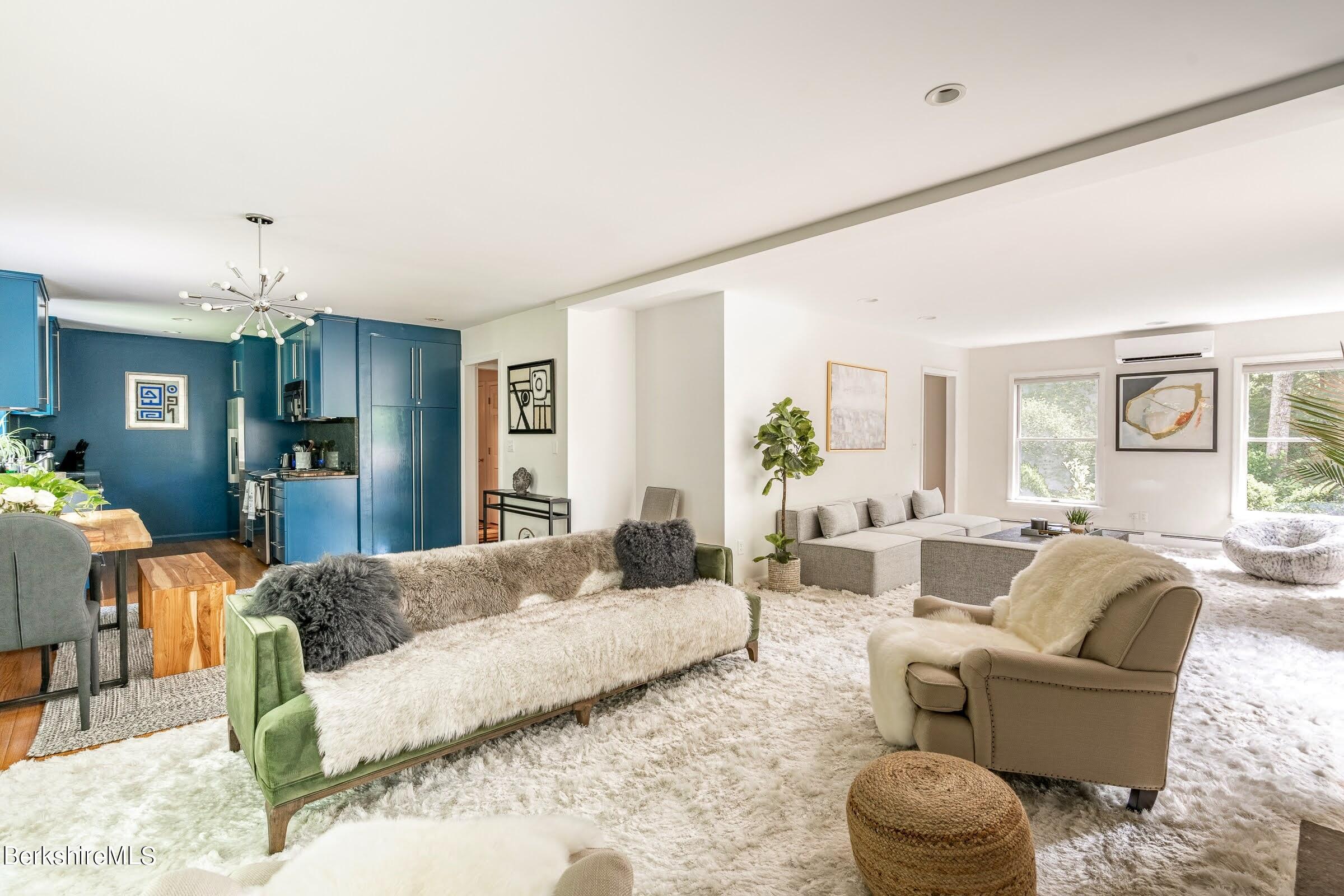 91 Brush Hill Road Great Barrington, MA 01230 - Photo 4 of 40 a living room with furniture and wooden floor