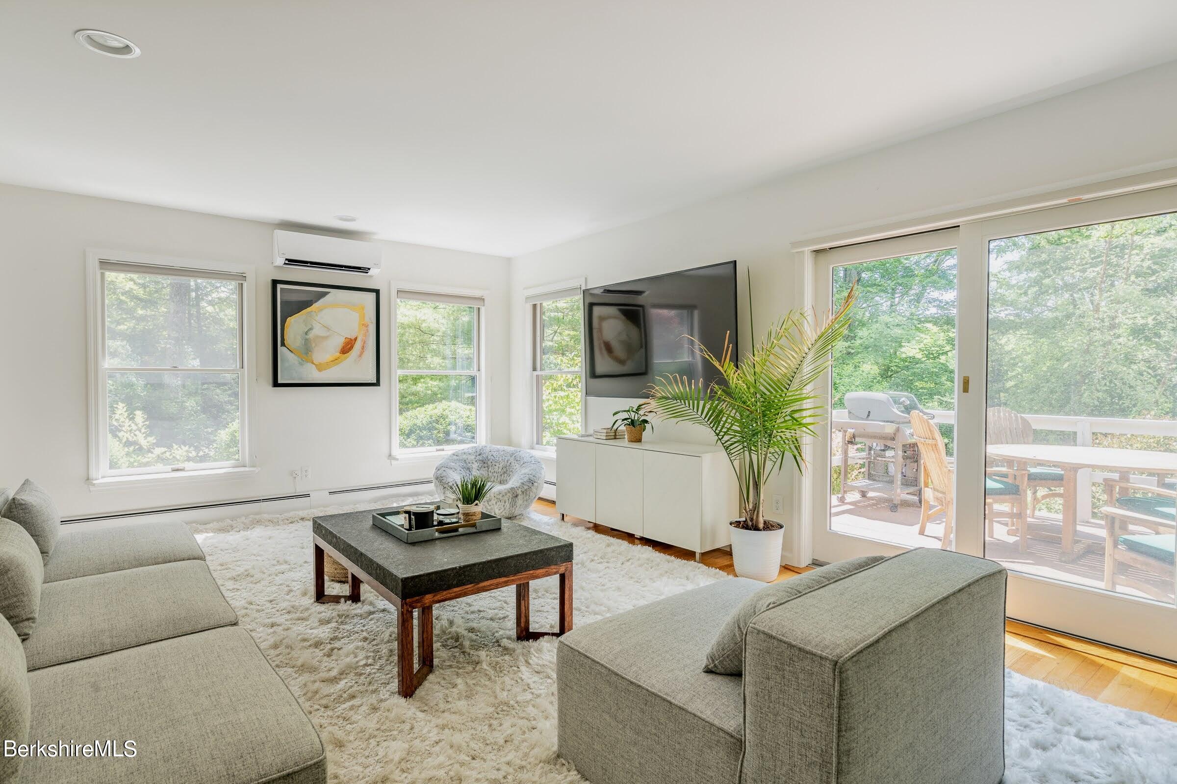 91 Brush Hill Road Great Barrington, MA 01230 - Photo 5 of 40 a living room with furniture and a window