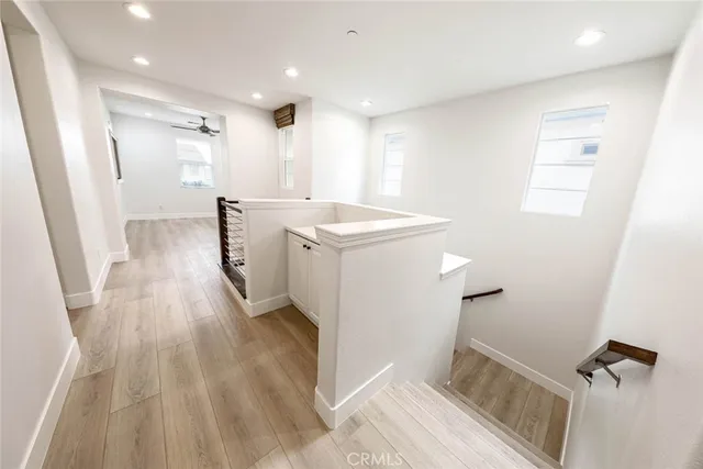 a view of a kitchen from the hallway