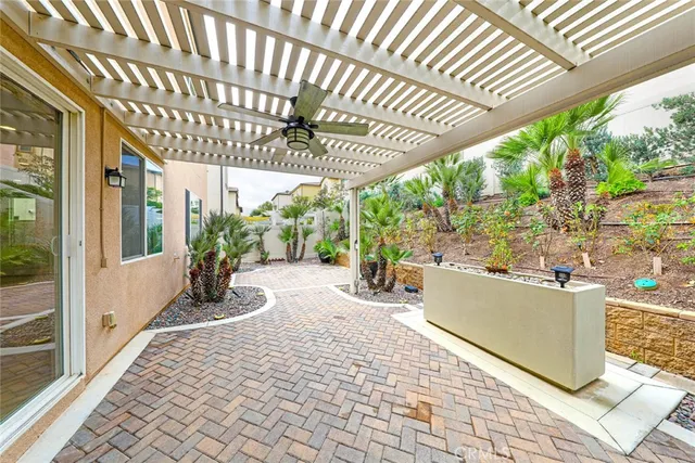 a house view with a sitting space and garden view