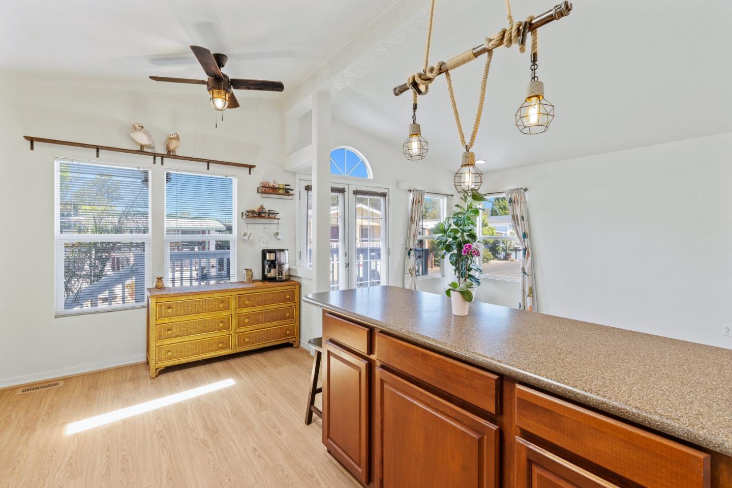 100 North Rodeo Gulch Road, Unit 31 Soquel, CA 95073 - Photo 14 of 38 a kitchen with stainless steel appliances granite countertop a sink window and wooden floor