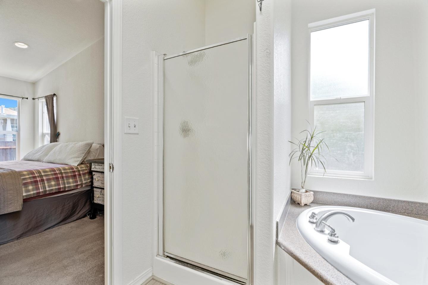 100 North Rodeo Gulch Road, Unit 31 Soquel, CA 95073 - Photo 23 of 38 a bathroom with a tub and a window