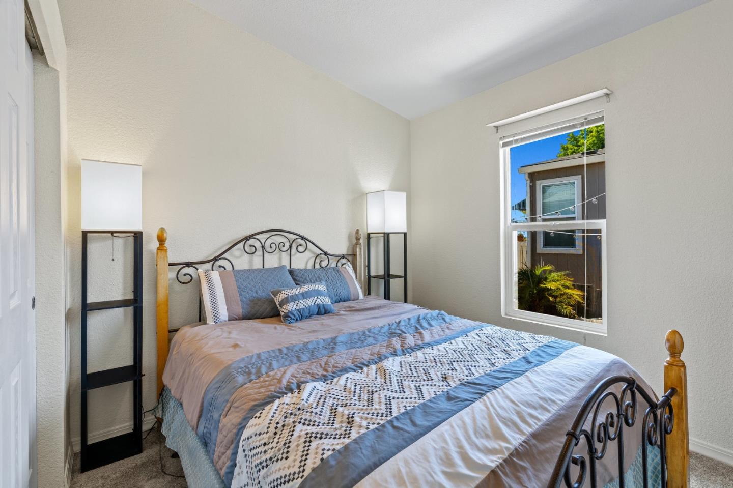 100 North Rodeo Gulch Road, Unit 31 Soquel, CA 95073 - Photo 24 of 38 a bedroom with a bed and a window